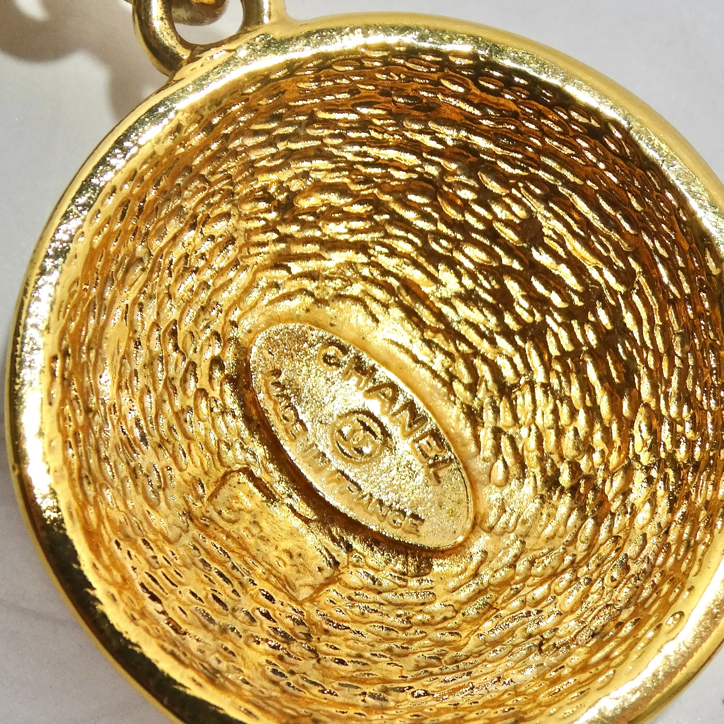 Chanel 1980s Gold Tone Logo Quilted Medallion Necklace