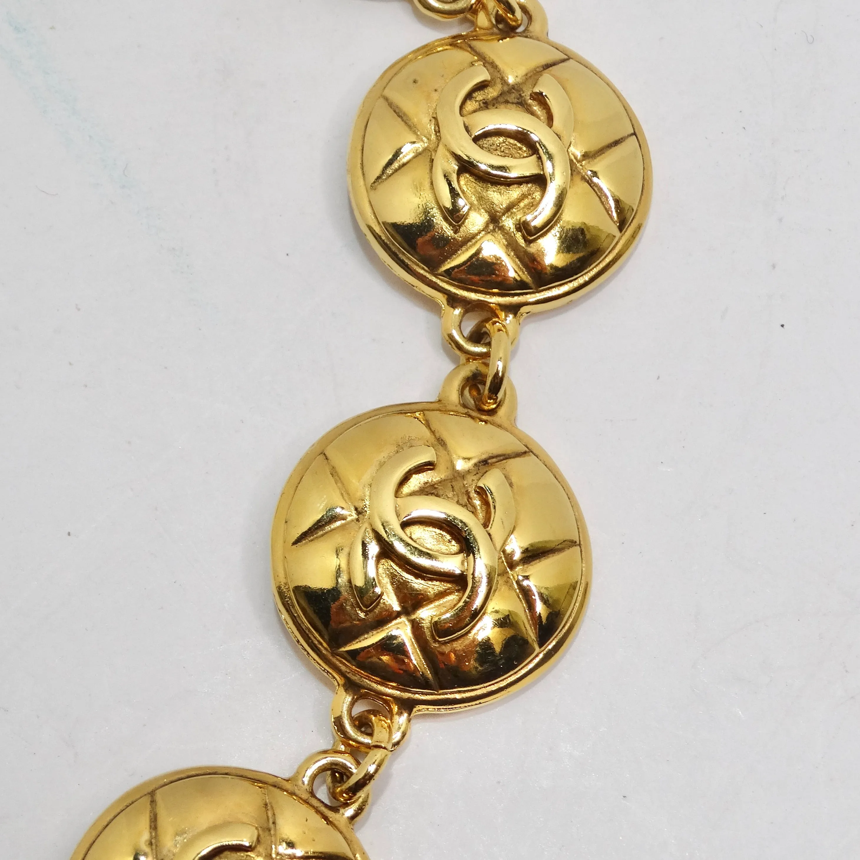 Chanel 1980s Gold Tone Logo Quilted Medallion Necklace